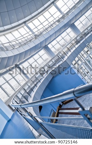 rounded balconies in an interior of modern office building