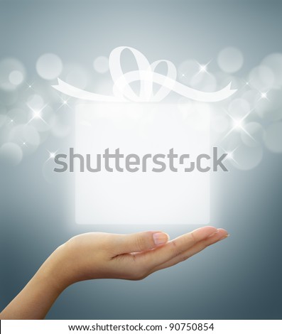 gift box Translucent white on woman hand Royalty-Free Stock Photo #90750854