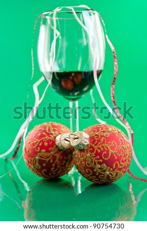 New Year's still life - glasses of wine and Christmas balls