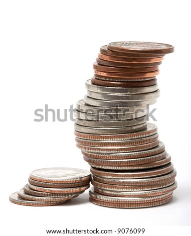 Stack of dollars and coins isolated on white