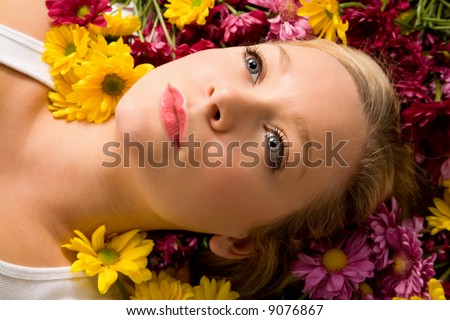 Pretty Woman Laying in Flowers