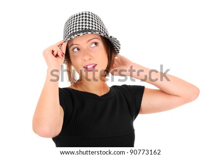 A picture of a young woman in a shepherd's plaid hat smiling over white background