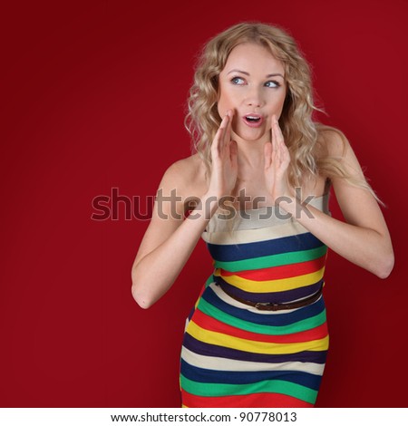 Blond woman with attitude of whispering