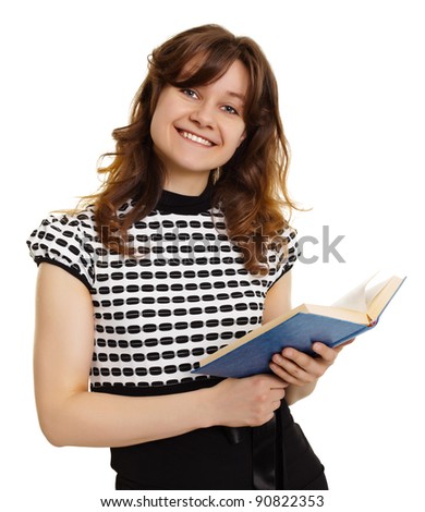 Cheerfully smiling girl with a book isolated on white background