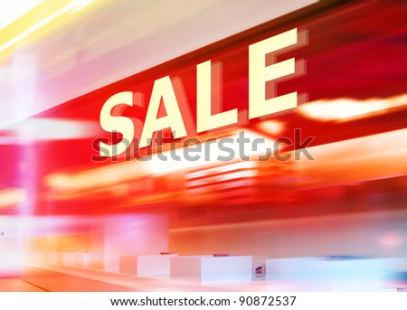 Shop Window With Sale Sign at night