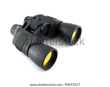 Black binoculars with yellow lens over white