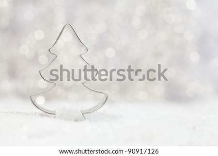 metal tree cookie cutter with beautiful background