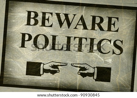  aged and worn vintage photo beware politics sign with fingers pointing