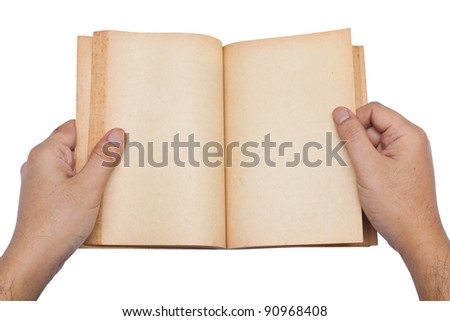 Hand open blank pages of old book
