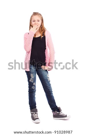 Full length portrait of a cute schoolgirl isolated on white background