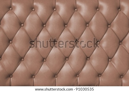 background image of plush brown leather