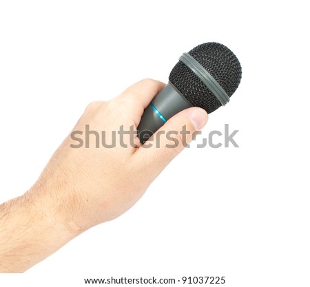 Karaoke microphone in hand. Isolated on white background.
