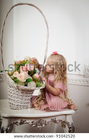 Image of a little girl in a fashionable luxury interior