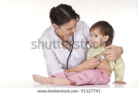 cute doctor with little girl on white
