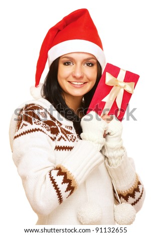 A young woman with a Christmas present , isolated on white background