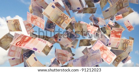 euro bills flying in the sky