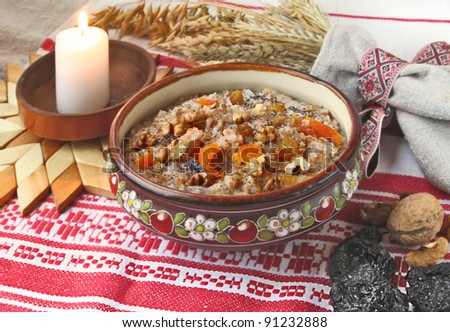 Pot with wheat porridge which is cooking on Eve Christmas  Kutya is a traditional food on  Eve holiday. Royalty-Free Stock Photo #91232888