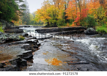  Canyon Falls, brilliant Autumn colors at the sturgeon river near Alberta, Michigan USA