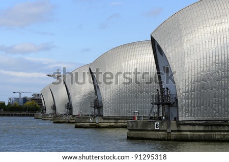 The Thames Barrier in London England. The Thames Barrier is the world's second largest movable flood barrier Royalty-Free Stock Photo #91295318