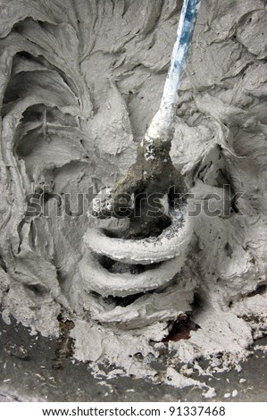 stucco mixer during the work , contraction industrial background