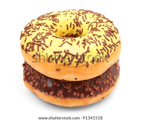 Two glazed donut with cocoa and vanilla sprinkles isolated on white background.