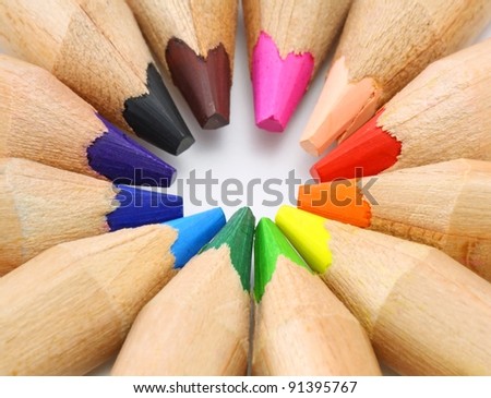 Color pencils set as color wheel on white background