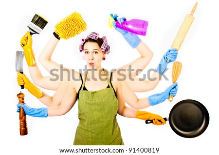 A happy very busy multitasking housewife Royalty-Free Stock Photo #91400819