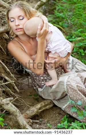 Mother with baby at outdoors