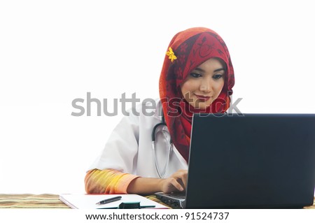 medical doctor woman working with computer. Isolated over white