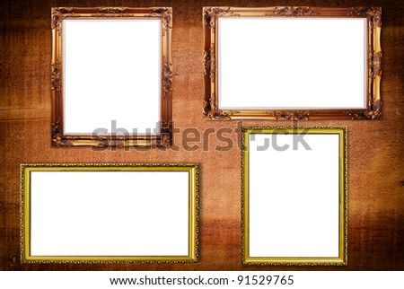 Photo frame on the wood texture.