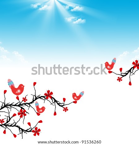 Beautiful blossom cherry and birds on blue sky background