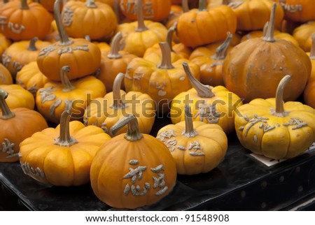 Orange pumpkins with chinese character, symbolizing good luck