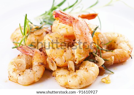 fried black tiger prawns with herbs and spices Royalty-Free Stock Photo #91610927