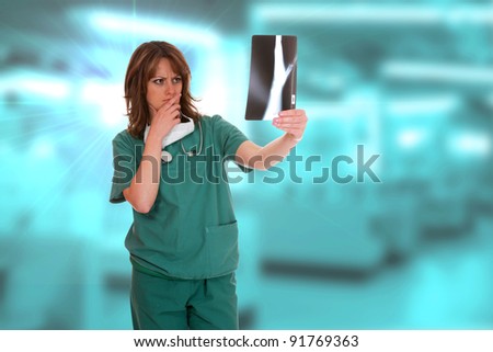 Confident professional doctor looking at xray