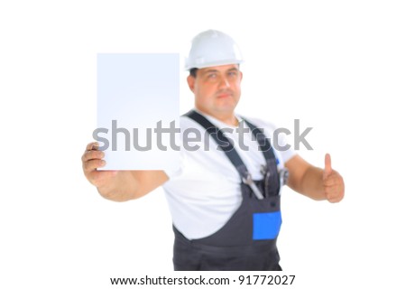 Confident worker presenting empty board and making ok sing