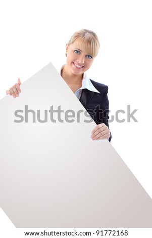 Happy smiling young business woman showing blank signboard, isolated on white background