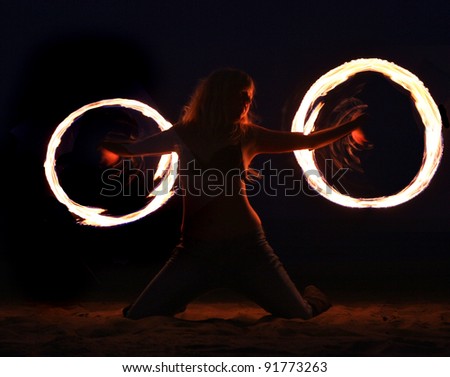 Beautiful Fire Dance on the Beach at Night