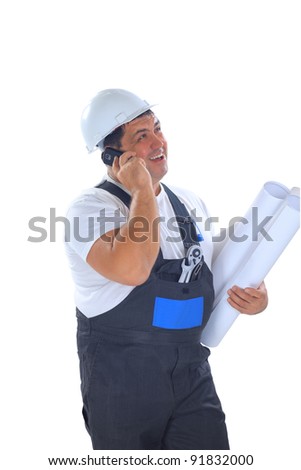 Confident worker with plans talking on mobile phone