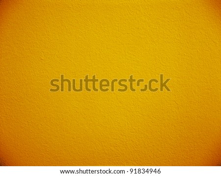 Orange paint wall closeup 2.