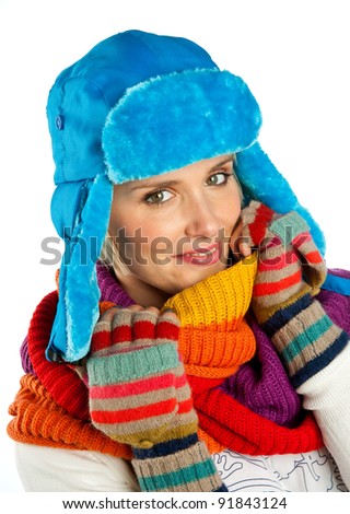 attractive woman in winter clothes making expression