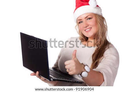 Business woman in Christmas cap with notebook shows gesture ok on a white background.