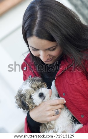 Young beautiful woman with little dog