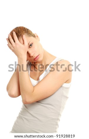 Young woman with head pain on white background