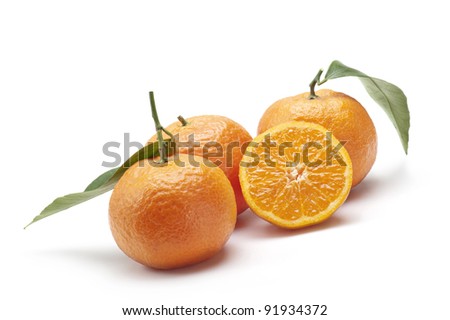 tangerines with a slice, on white background