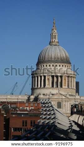 Millennium bridge supporting cables and St Pauls cathedral London
