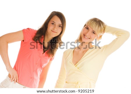 Two teenage girls isolated on white background