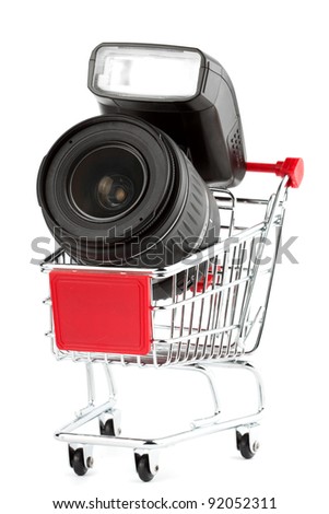 Photo Lens in Shopping Cart on the white