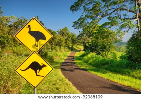 Kangaroo and Cassowary warning sign at a lonely country road in the Atherton Tablelands, Queensland, Australia