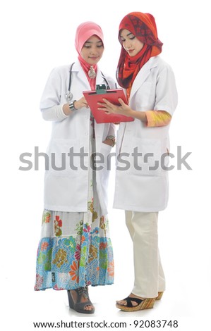two beautiful medical doctor isolated on white background