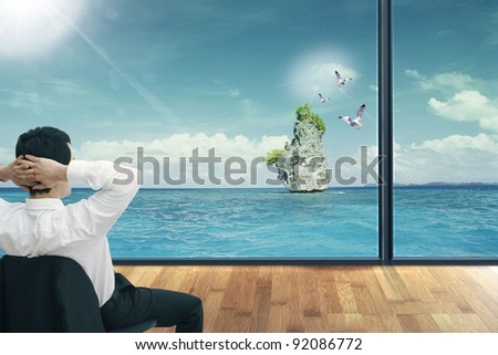 Man in sea looking Royalty-Free Stock Photo #92086772